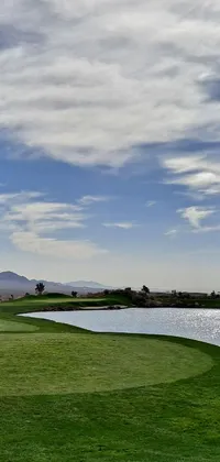 Indulge in the scenic beauty of a golf course with this phone live wallpaper