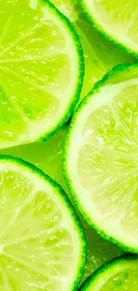 This lively phone wallpaper showcases stacked lime slices bursting with juicy flavor