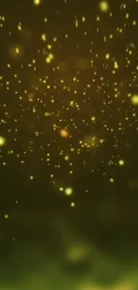 This stunning live wallpaper features yellow fireflies flying in a galaxy background full of twinkling stars