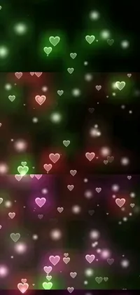 This alluring phone live wallpaper features a beautiful digital art of fluttering hearts in green and pink hues against a black background