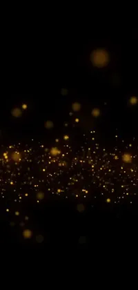 This stunning live wallpaper for your phone features a black background with an abundance of gold sparkles that twinkle and move in a hypnotic pattern