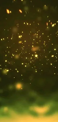 This phone live wallpaper features yellow fireflies hovering in the air, set against a picturesque forest