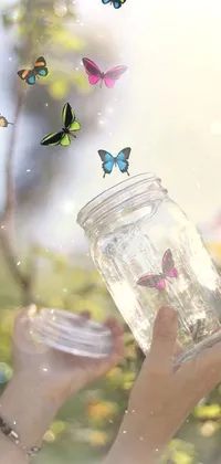 This phone live wallpaper features a realistic photo of a jar filled with brightly colored butterflies