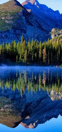 This phone live wallpaper presents a calm body of water surrounded by trees and mountains captured in Colorado by a talented photographer