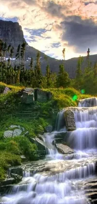 Adorn your phone screen with a mesmerizing and serene live wallpaper of a mountainous landscape