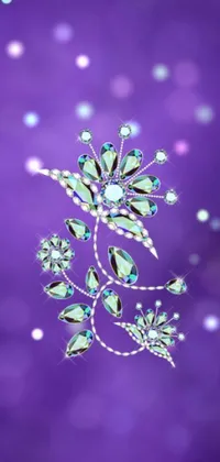 This phone live wallpaper showcases a digital rendering of a beautiful snowflake against a purple backdrop