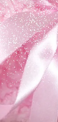 This live wallpaper features a lovely close-up of a pink teddy bear with a ribbon
