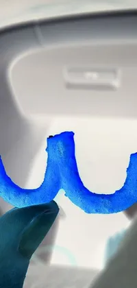 This phone live wallpaper showcases a digital rendering of a toothbrush close-up