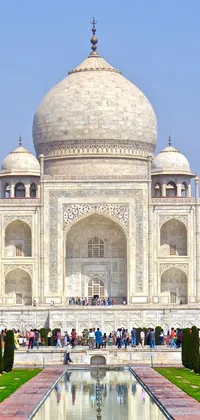 Immerse yourself in history with this stunning phone live wallpaper featuring an ancient city of white stone, with a round-cropped Taj Mahal facade in the background, adorned with a futuristic geodesic dome