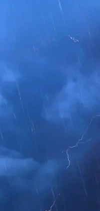 Bring the storm to your phone with this electrifying live wallpaper! Watch as lightning bolts illuminate the thick strands of mucus and raindrops cascading down the clouds