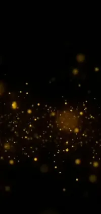 This phone live wallpaper depicts a mesmerizing scene of golden lights and bubbles against a black matte background
