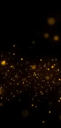 This stunning live wallpaper features digital art lights on a black background with scattered golden flakes, creating an enchanting mobile display