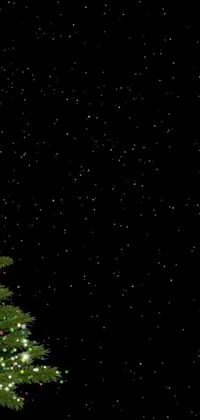 This festive live wallpaper features a digital rendering of a glowing Christmas tree against a starry black sky