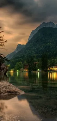 This phone live wallpaper features a gorgeous landscape of a tranquil body of water set against breathtaking mountains