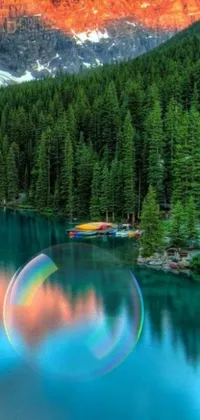This phone live wallpaper showcases a stunning landscape with a mountain and water body