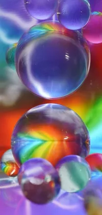 This live wallpaper features a stunning macro photograph of bubbles floating on a colorful surface, creating a mesmerizing effect on your phone screen