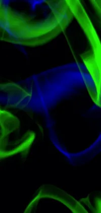 This phone live wallpaper features a black background with moving green and blue smoke