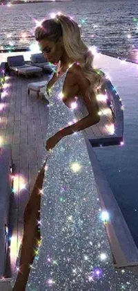 This stunning phone live wallpaper features a digital rendering of a woman standing on a dock near sparkling water