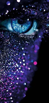 This live wallpaper features a seductive close-up of a person's face with shimmering glitter