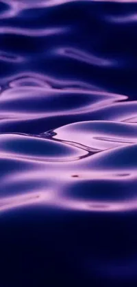 The "Water Surface Macro" live wallpaper is a visually captivating feature for your mobile device