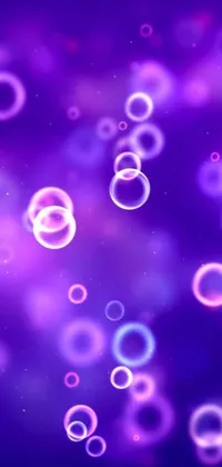 This phone live wallpaper features a stunning collection of bubbles floating in the air