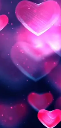 This stunning live wallpaper features a mesmerizing display of pink hearts set against a backdrop of twinkling stars