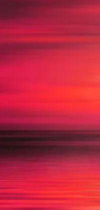 This captivating live wallpaper features an abstract sunset theme, showcasing a beautiful crimson gradient with warm happy hues