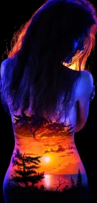 This phone live wallpaper showcases a stunning digital artwork of a woman with a sunset painted on her body
