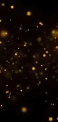 Looking for a black and yellow themed live wallpaper for your phone? Consider this one with a yellow spotlight shining on a black background, and stars and spores floating in the air