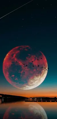 This phone live wallpaper showcases a stunning full moon reflecting in a body of water, bringing to life a magnificent space art scene of a red planetoid exploding