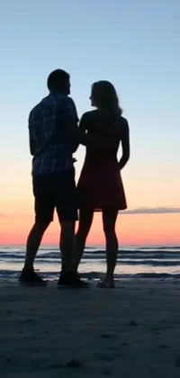 Experience the magic of a romantic sunset proposal with this breathtaking live wallpaper