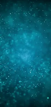 Experience a breathtaking phone live wallpaper featuring a blurry blue background with digital art in dark teal tones
