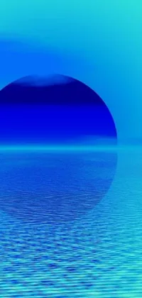 This phone live wallpaper features a beautiful digital artwork of a circular object in the middle of a vast blue body of water