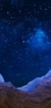This live wallpaper showcases a stunning night sky filled with thousands of stars alongside a picturesque mountain range