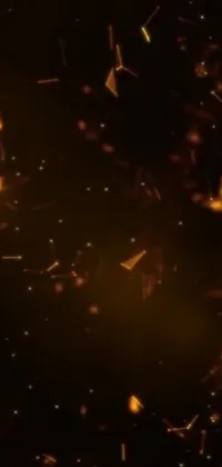 This breathtaking live wallpaper for your phone depicts a celestial space filled with sparkling stars, veins of luminous magma and gold, and dynamic motion graphics set against an orange background