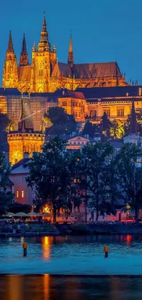 This vibrant live wallpaper depicts a grand castle on a hill, overlooking a peaceful river, with a bustling city in the background