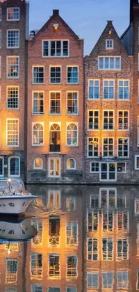 This live wallpaper showcases a serene water scene with a resting boat and charming Dutch-style buildings in the background