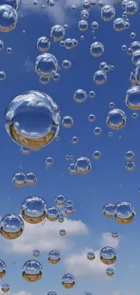 This phone live wallpaper features a captivating display of floating bubbles, perfect for those wanting a peaceful background