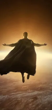 This live wallpaper features an otherworldly being, soaring through the air with their cape flowing dramatically behind them