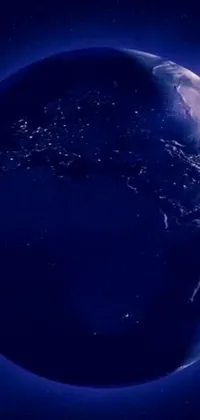 This stunning live wallpaper showcases the Earth from space at night, with vibrant digital art creating a mesmerizing visual experience