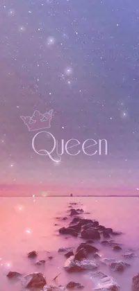 This stunning phone live wallpaper features a rocky beach scene with the word "queen" displayed prominently on a rock