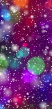 This phone live wallpaper features colorful lights set against a snowy landscape backdrop