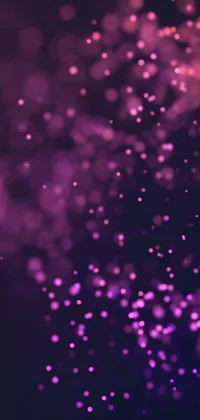 This phone live wallpaper features a striking digital artwork of a purple and black background with light particles and bokeh effects