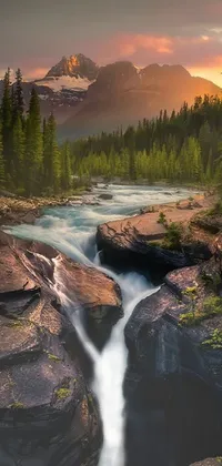 This phone live wallpaper features a serene waterfall located near a mountain with a beautiful sunrise in the background