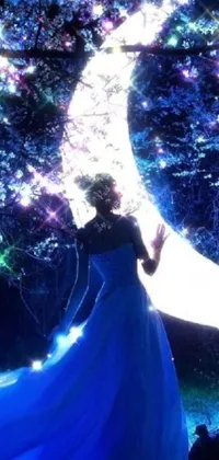 This mesmerizing phone live wallpaper showcases a digital art image featuring a woman in a blue dress standing before a crescent in a forest at night