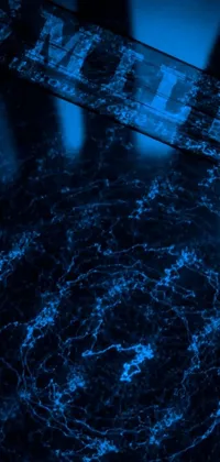 This phone live wallpaper showcases a skateboard resting on a sleek marble floor, featuring glowing blue veins and intricate digital art effects