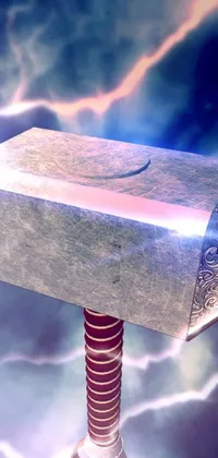 This phone live wallpaper features a digital art rendering of Thor's Mjolnir, the iconic hammer of the thunder god