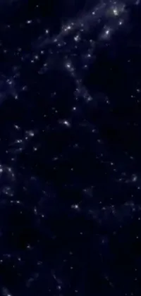 This stunning phone live wallpaper showcases a gorgeous night sky filled with dazzling stars against a dark backdrop