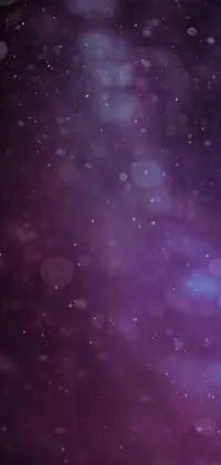 This live phone wallpaper features a pair of sleek skis on a snow covered ground, surrounded by a colorful purple nebula, ethereal bubbles, and a dark abstract background
