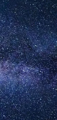 This mesmerizing live wallpaper depicts a stunning night sky filled with twinkling stars and vibrant space art